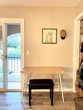 a view of a livingroom with furniture and window