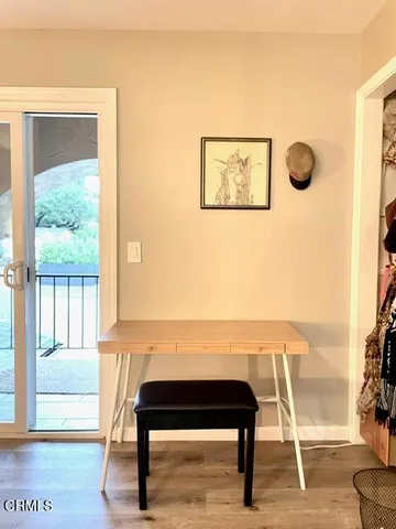 a view of a livingroom with furniture and window