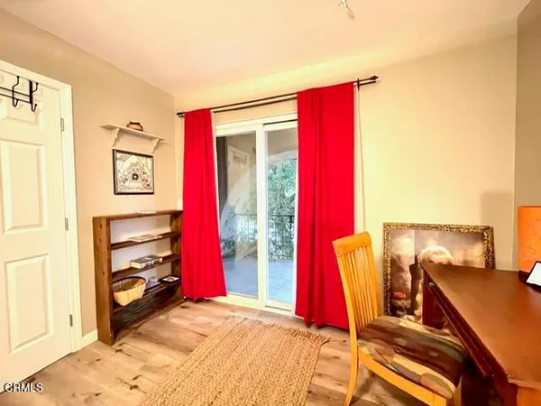 a bed room with a bed and a window