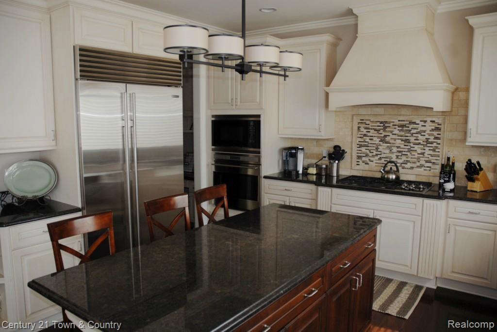 2947 South Addison Circle Rochester, MI 48306 - Photo 26 of 54 Kitchen Island, Sub Zero Refrigerator