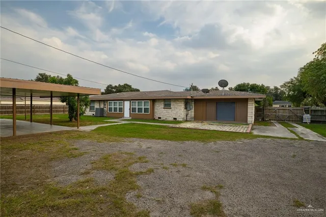 a view of house with outdoor space
