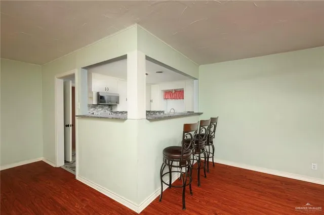 a workspace with wooden floor