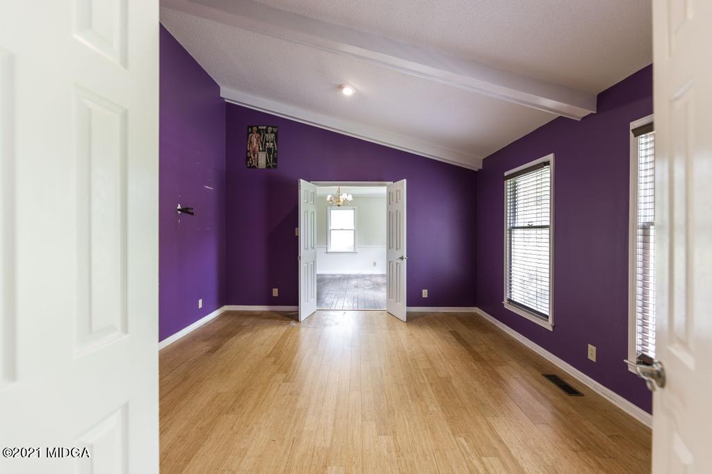 225 Beacon Hill Road Macon, GA 31210 - Photo 2 of 29 a view of empty room with window