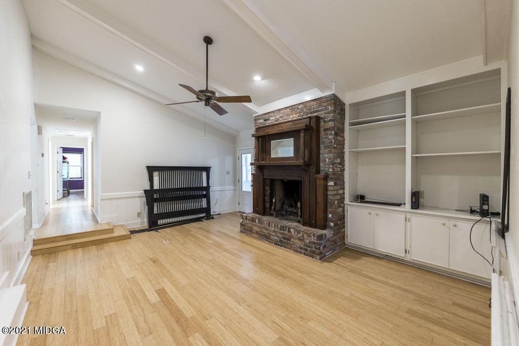 225 Beacon Hill Road Macon, GA 31210 - Photo 7 of 29 a living room with furniture and a fireplace
