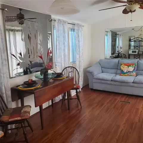 a view of a workspace with furniture