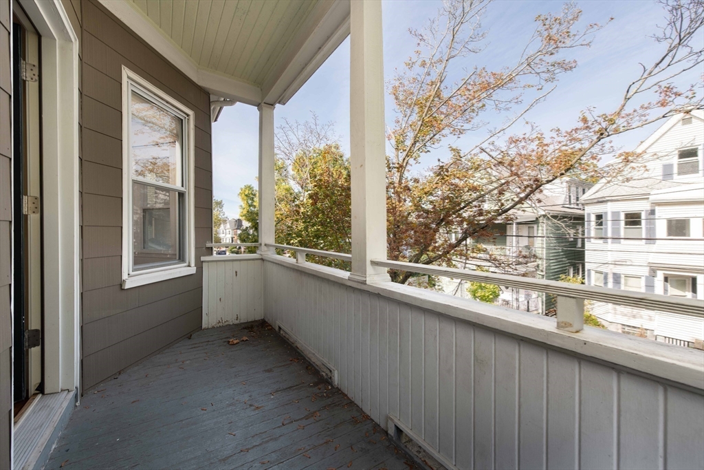 148 Albion Street, Unit 2 Somerville, MA 02144 - Photo 19 of 21 a view of a building from a balcony