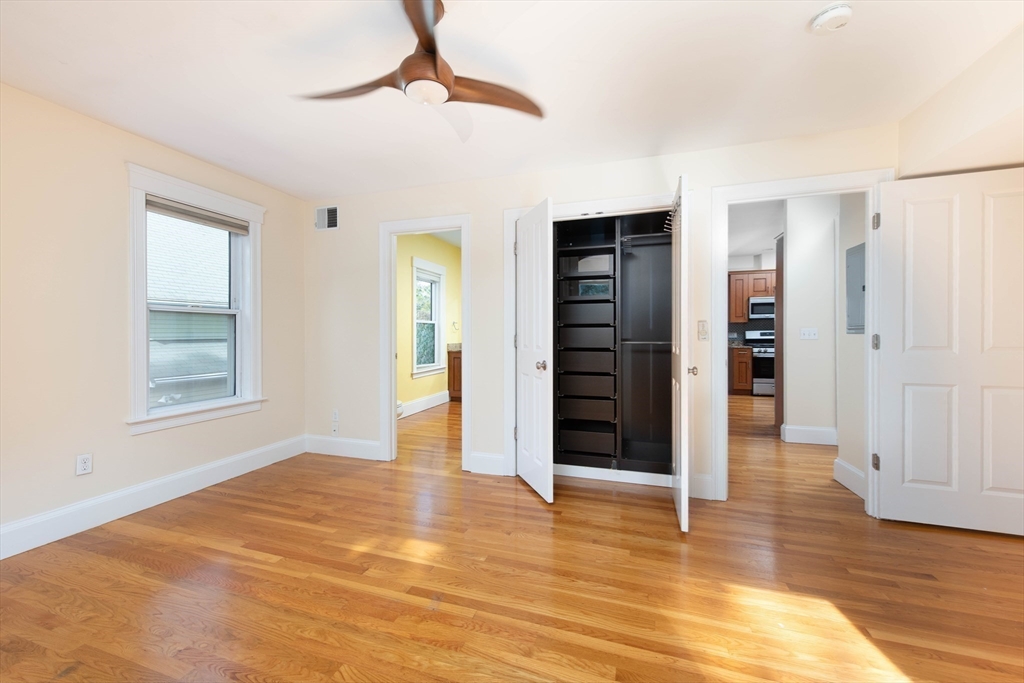148 Albion Street, Unit 2 Somerville, MA 02144 - Photo 9 of 21 a view of an empty room with closet and a window