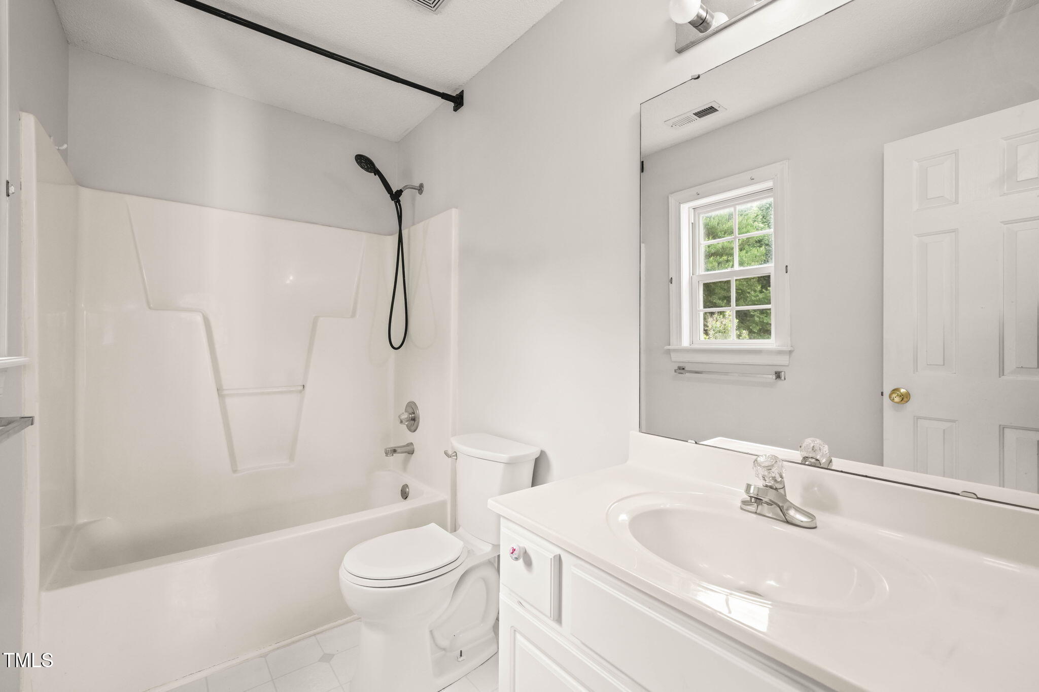 900 Borage Drive Wake Forest, NC 27587 - Photo 29 of 43 a bathroom with a sink a toilet and shower