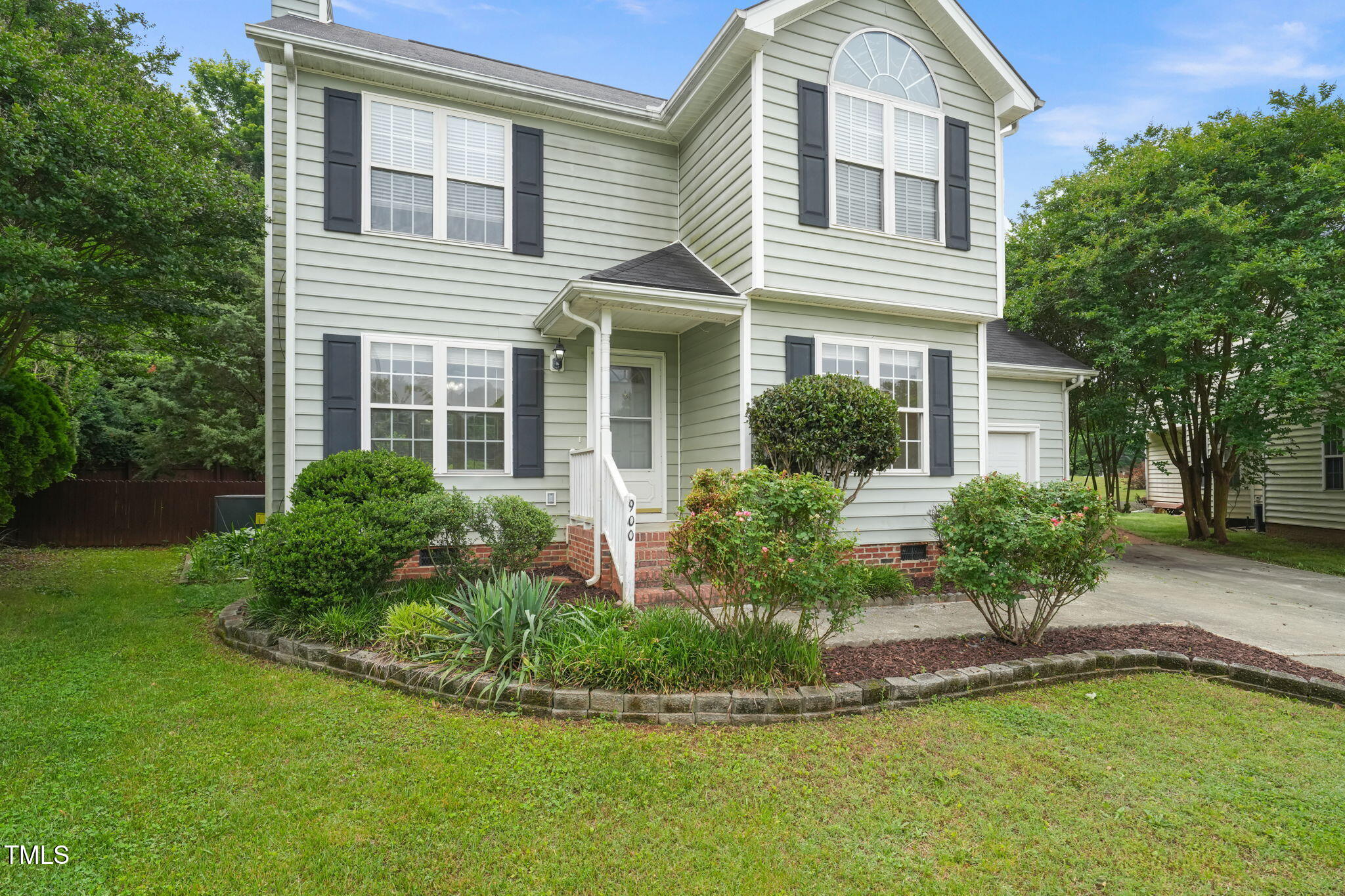 900 Borage Drive Wake Forest, NC 27587 - Photo 2 of 43 a front view of a house with yard and green space