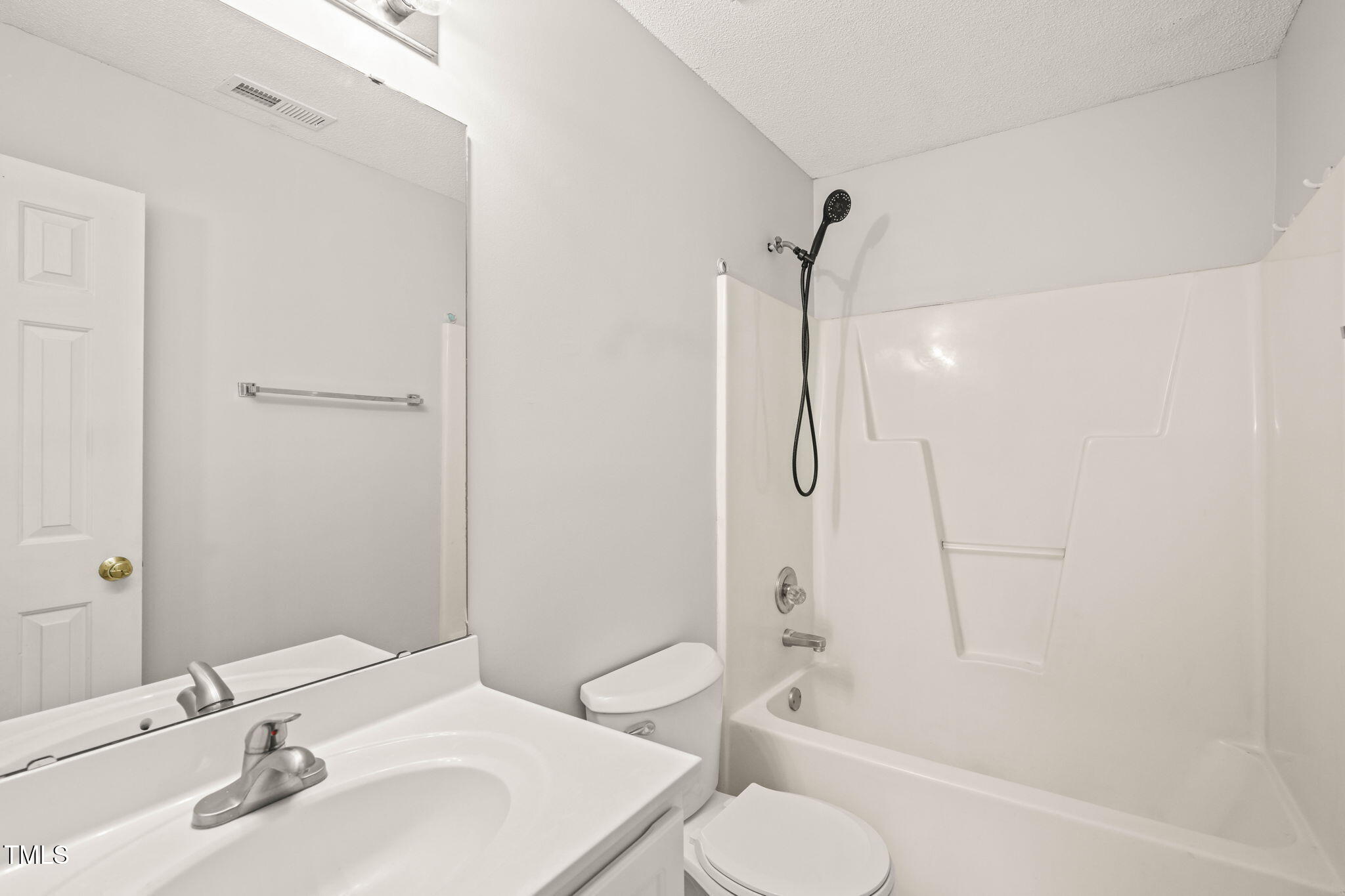 900 Borage Drive Wake Forest, NC 27587 - Photo 32 of 43 a bathroom with a sink toilet and shower