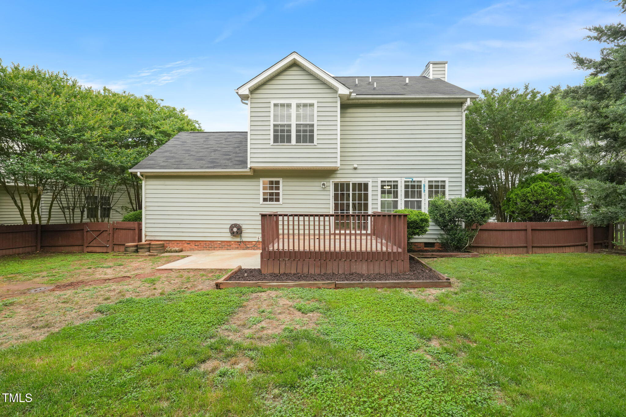 900 Borage Drive Wake Forest, NC 27587 - Photo 35 of 43 a front view of a house with a yard and trees