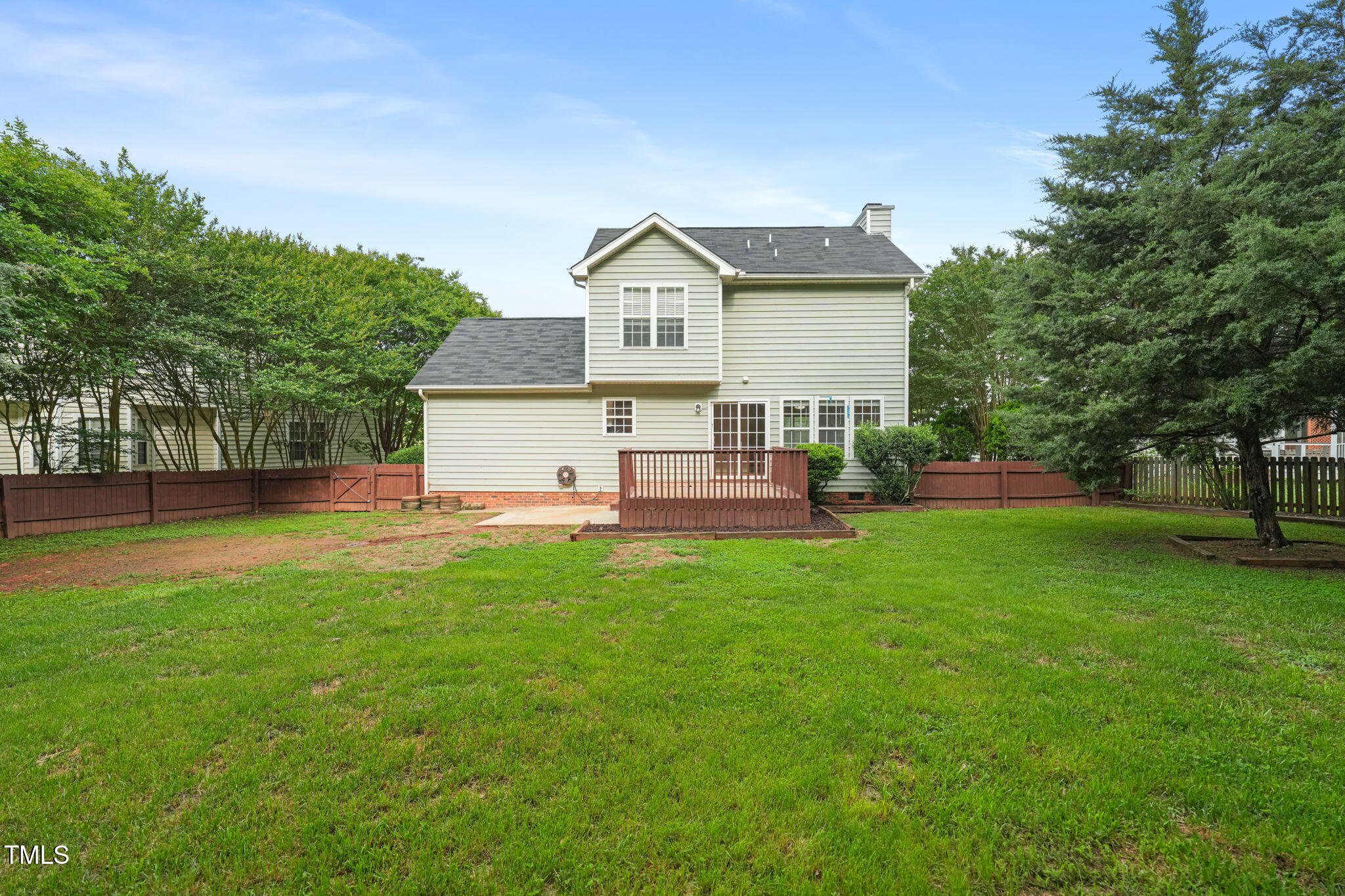 900 Borage Drive Wake Forest, NC 27587 - Photo 36 of 43 a view of a house with backyard and a tree