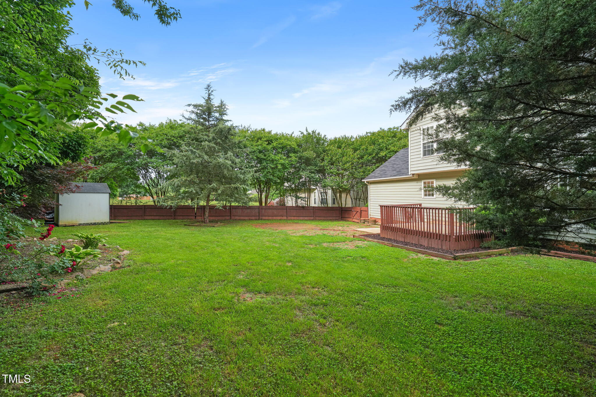 900 Borage Drive Wake Forest, NC 27587 - Photo 39 of 43 a view of house with backyard space and garden