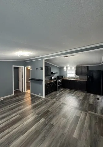 a view of kitchen and a sink