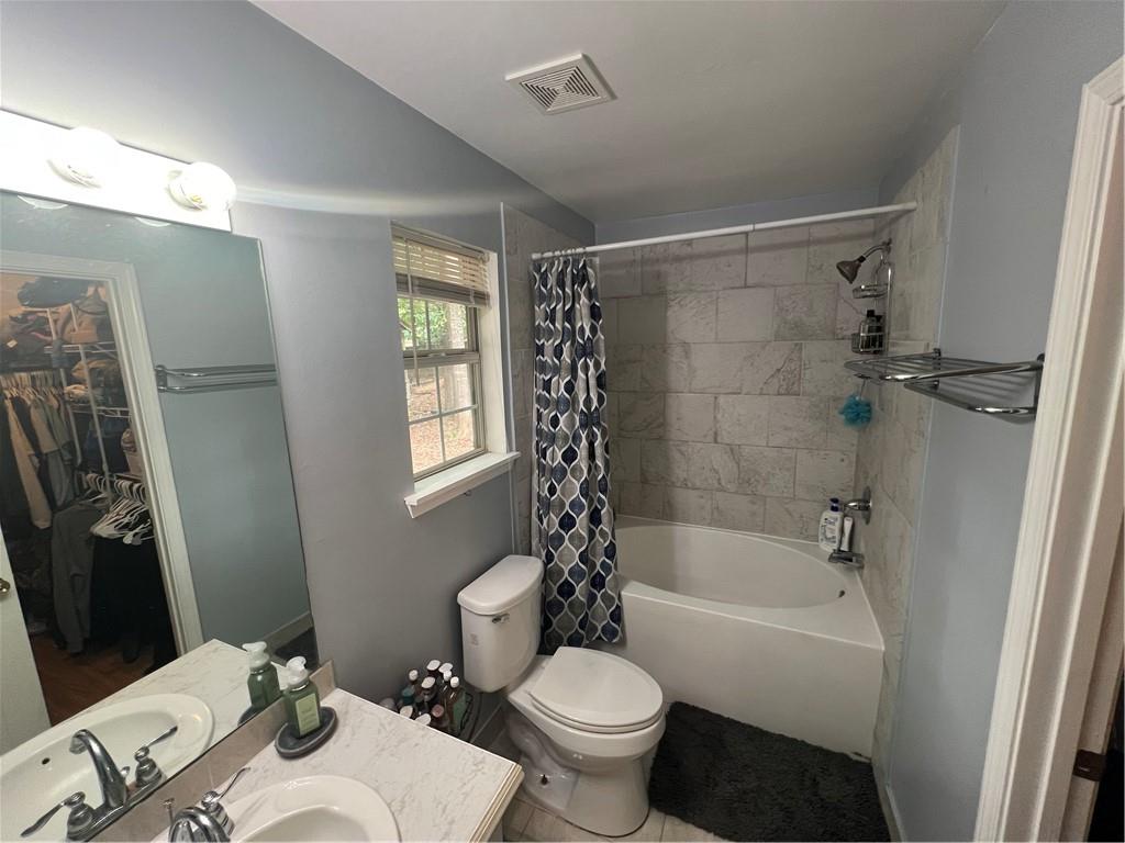 166 Barnetts Bridge Road Jackson, GA 30233 - Photo 15 of 29 a bathroom with a sink toilet and shower