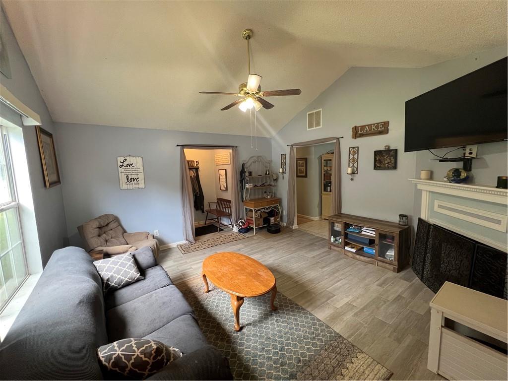 166 Barnetts Bridge Road Jackson, GA 30233 - Photo 7 of 29 a living room with furniture and a flat screen tv