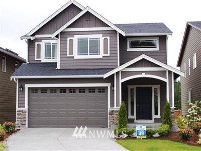617 195th Street Southeast Bothell, WA 98012 - Photo 1 of 1 a front view of a house with a yard