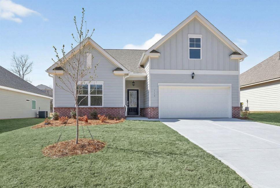 176 Greenview Court Homer, GA 30547 - Photo 1 of 19 a front view of a house with a yard and garage