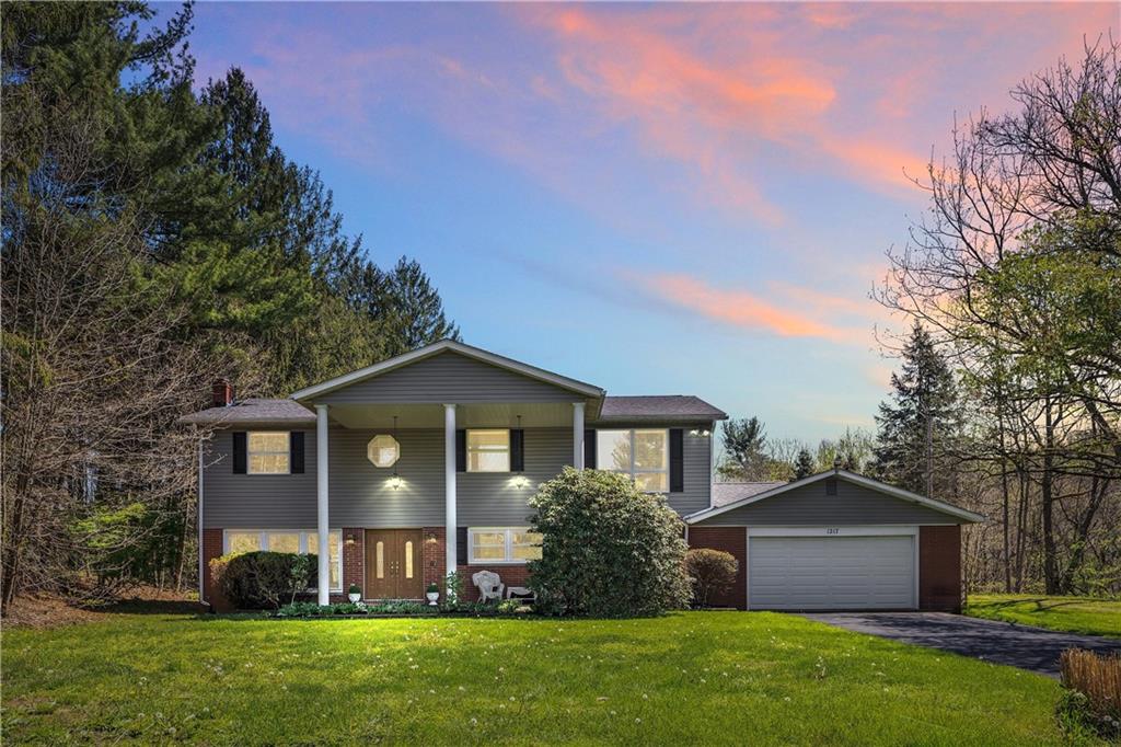 Wonderful 5 Bedroom, 3.5 Bath home on 3 Acres with 10 car garage (2 attached and 8 detached).