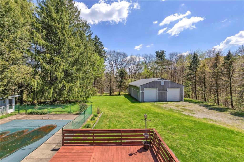 1217 Lovi Road Freedom, PA 15042 - Photo 2 of 39 8 car detached garage with update LED lighting and has a concrete floor. Wonderful inground pool with composite decking. Pool Shed. New Liner and pump. Also has a heater.