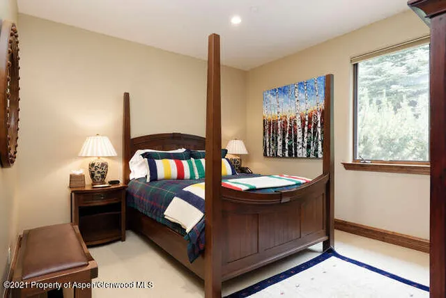 a view of a couches and dinning table in a room