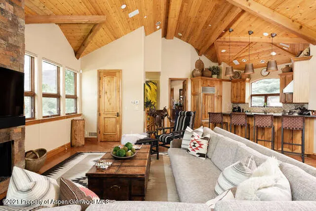 a view of a living room and bathroom
