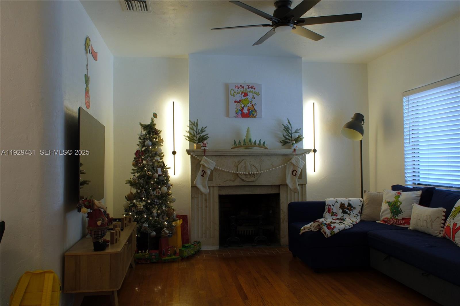 2818 Southwest 19th Street Miami, FL 33145 - Photo 14 of 43 a living room with furniture and a fireplace