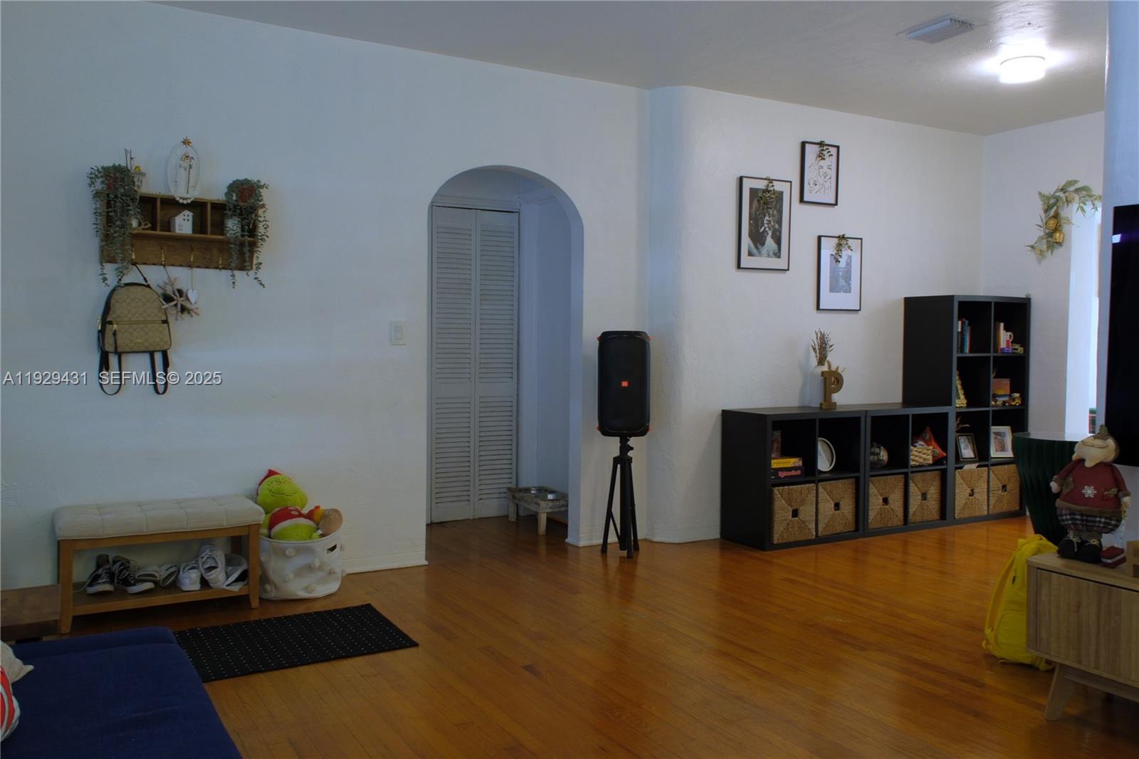 2818 Southwest 19th Street Miami, FL 33145 - Photo 16 of 43 a living room with furniture and a flat screen tv