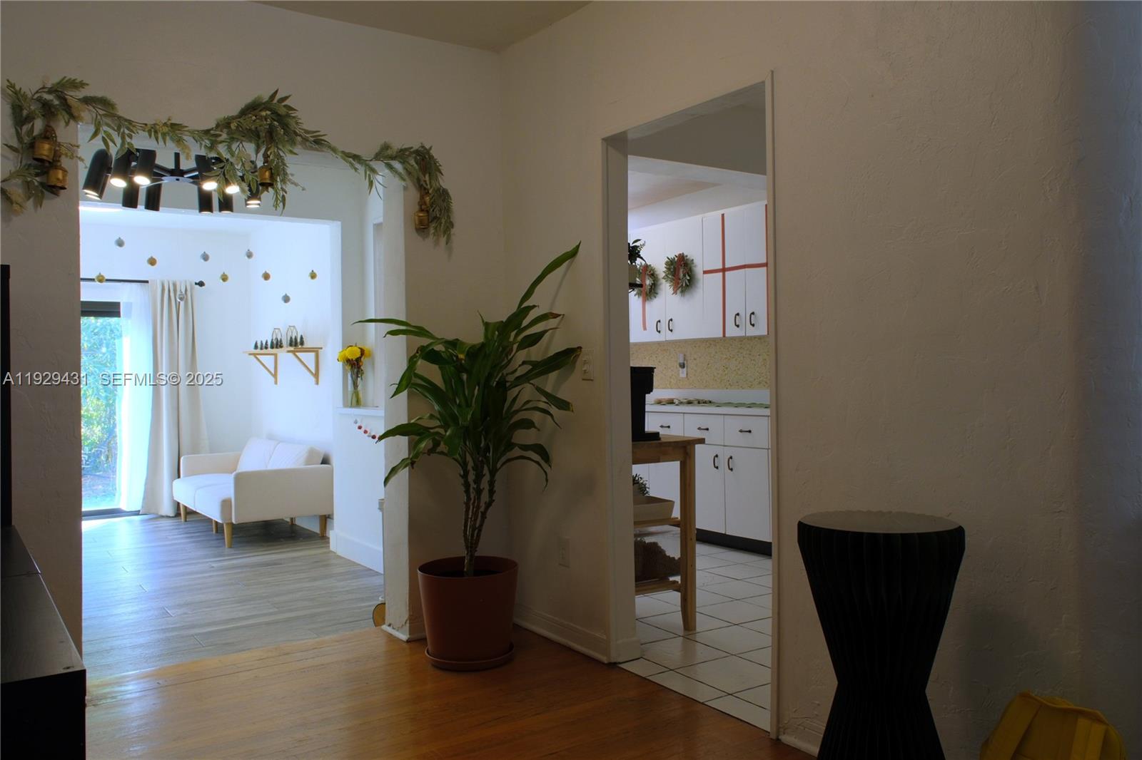 2818 Southwest 19th Street Miami, FL 33145 - Photo 21 of 43 a living room with furniture and a potted plant