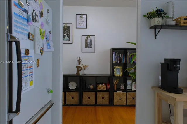 a kitchen with cabinets and appliances