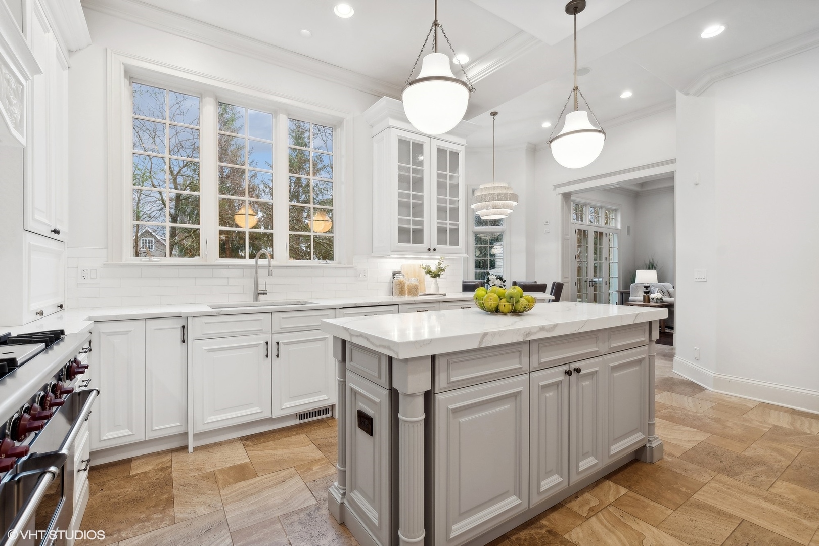 1016 Westmoor Road Winnetka, IL 60093 - Photo 13 of 48 a kitchen with a sink stove and cabinets