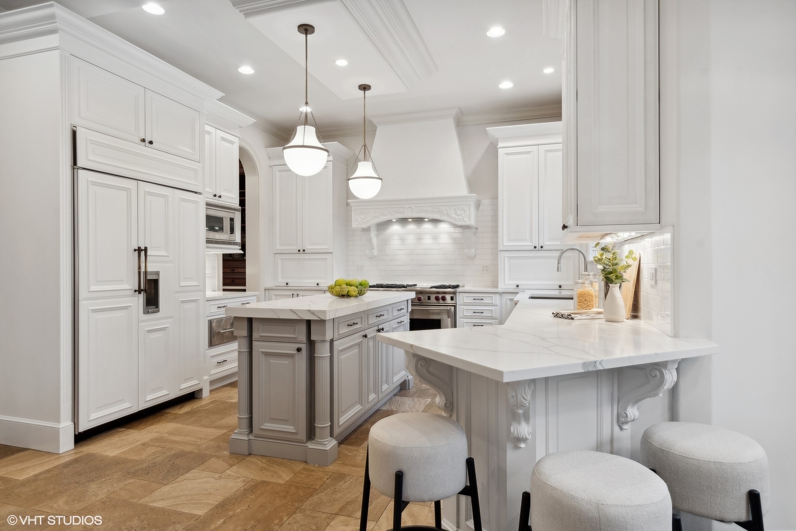 1016 Westmoor Road Winnetka, IL 60093 - Photo 16 of 48 a kitchen with stainless steel appliances a sink a stove a refrigerator cabinets and chairs
