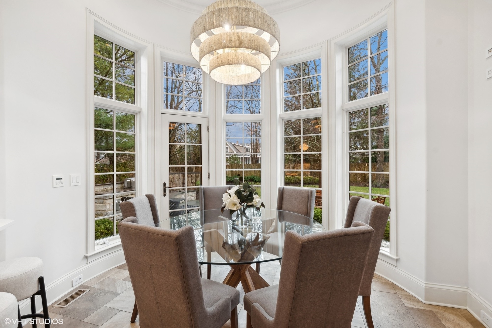 1016 Westmoor Road Winnetka, IL 60093 - Photo 17 of 48 a dining room with furniture and windows