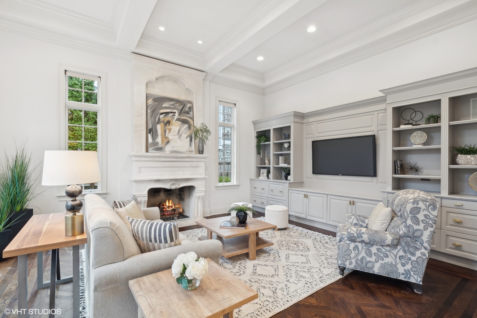 1016 Westmoor Road Winnetka, IL 60093 - Photo 19 of 48 a living room with furniture fireplace and a flat screen tv