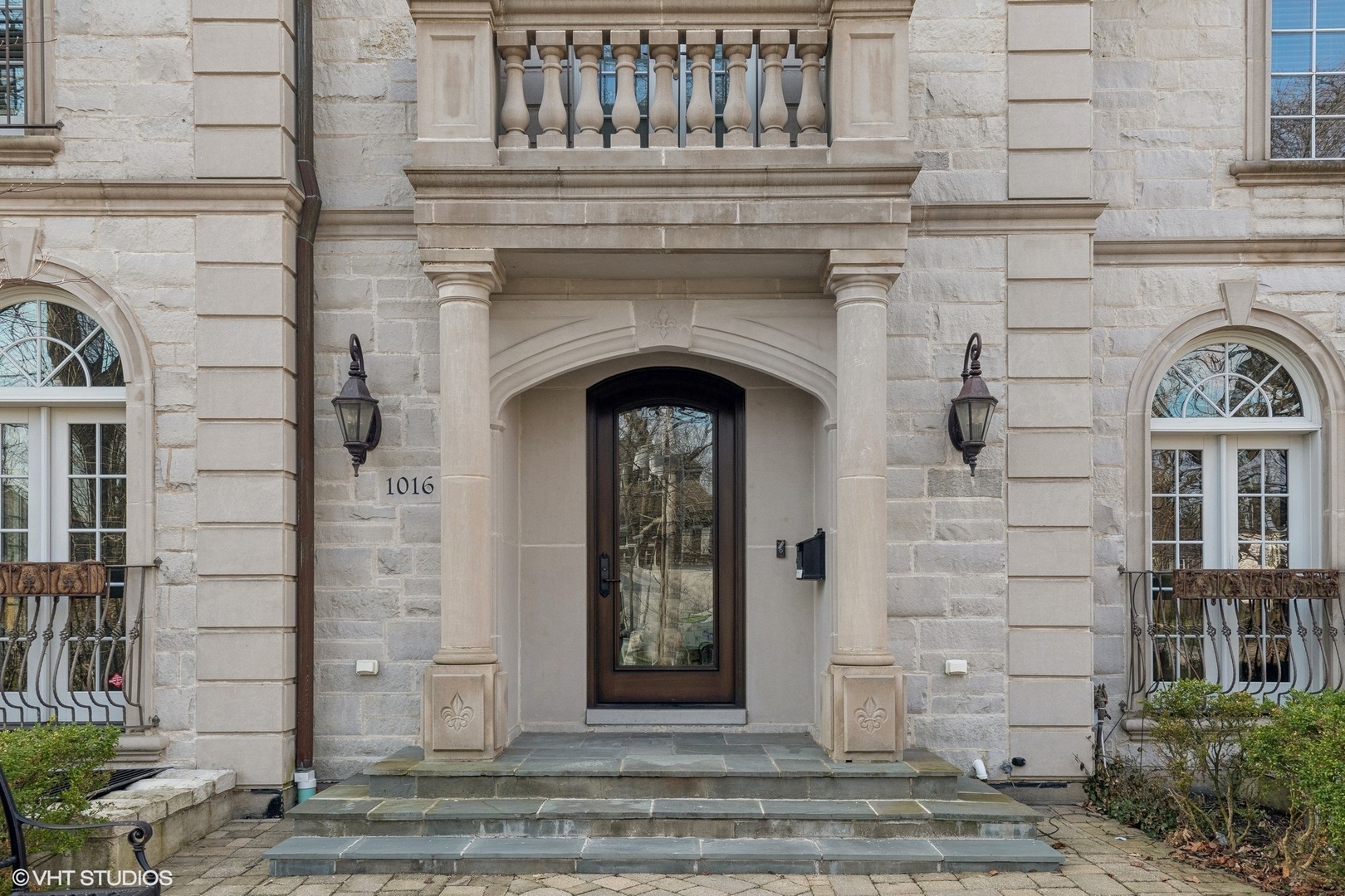 1016 Westmoor Road Winnetka, IL 60093 - Photo 2 of 48 a front view of a house with a door