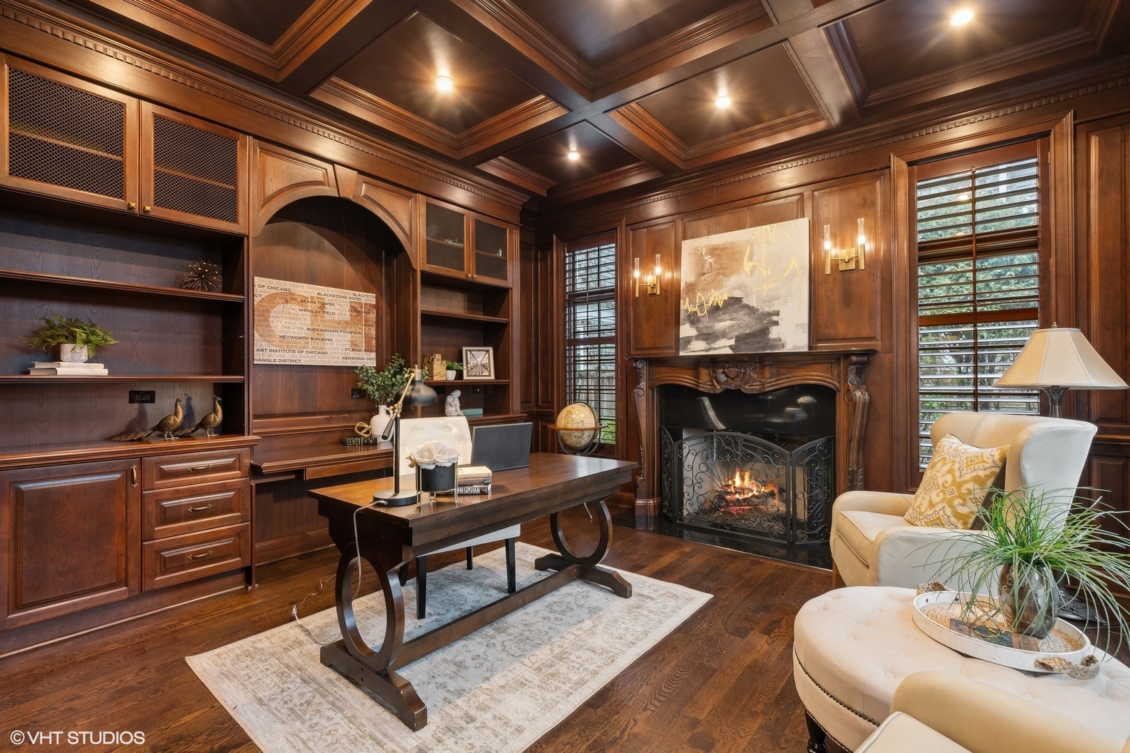 1016 Westmoor Road Winnetka, IL 60093 - Photo 23 of 48 a living room with furniture a fireplace and a flat screen tv