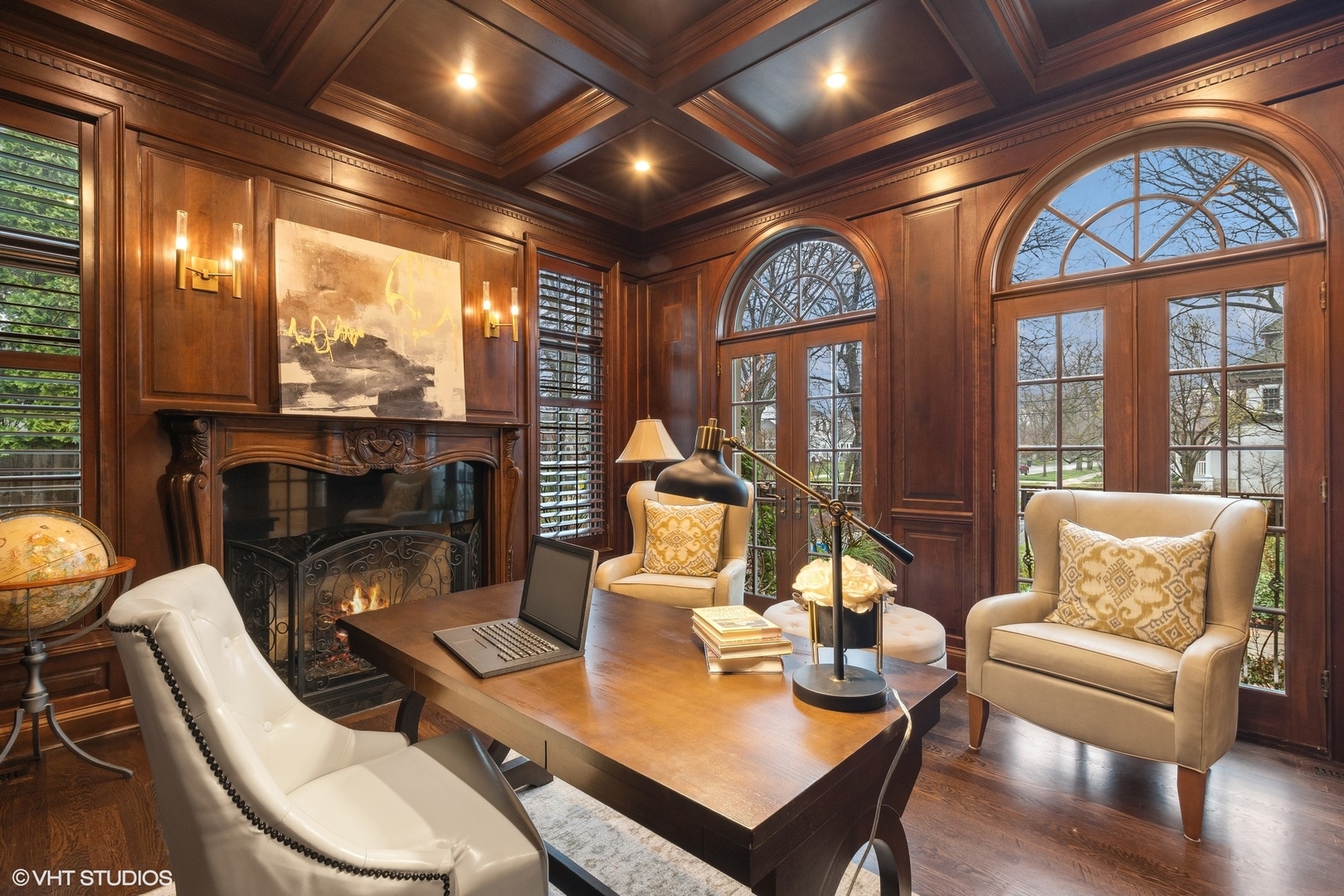1016 Westmoor Road Winnetka, IL 60093 - Photo 24 of 48 a living room with furniture a fireplace and a flat screen tv