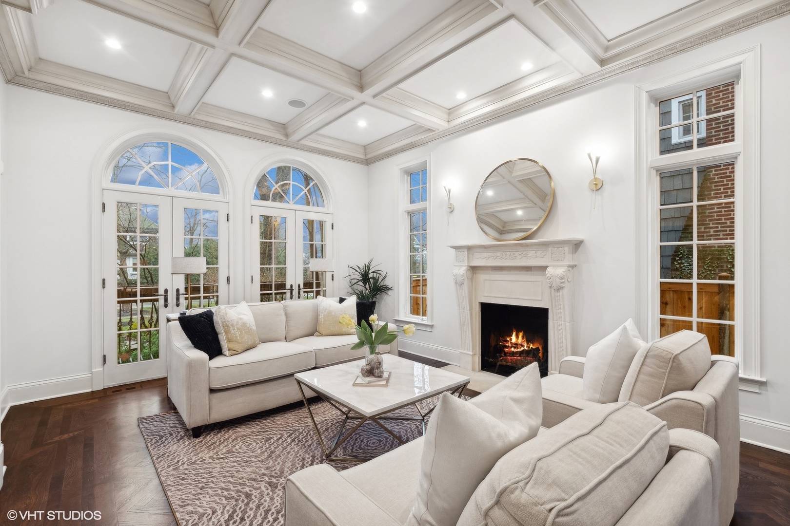 1016 Westmoor Road Winnetka, IL 60093 - Photo 5 of 48 a living room with furniture a fireplace and a large window