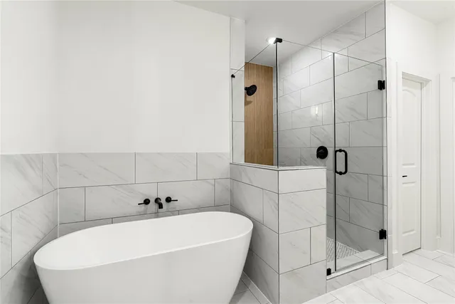 $679,000 | 1614 Ojeman Road, Unit K, Houston, TX 77055