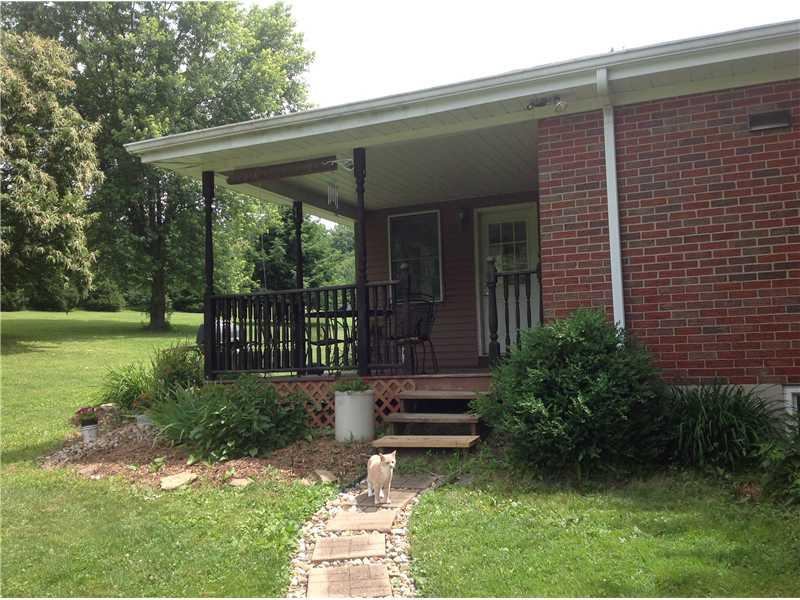 292 Leisie Road Renfrew, PA 16053 - Photo 20 of 24 Exterior Back. Walking path from side parking lot to the rear covered porch