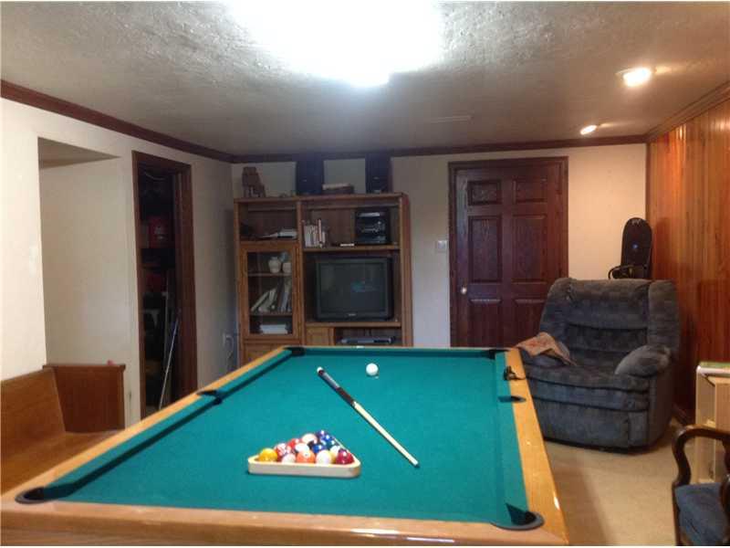 292 Leisie Road Renfrew, PA 16053 - Photo 21 of 24 Basement/Game Room. Large lower level game room, wood burner not included but will negotiate