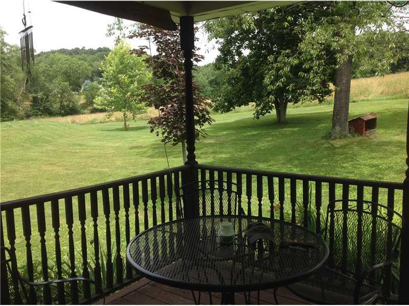 292 Leisie Road Renfrew, PA 16053 - Photo 7 of 24 Patio/Deck. Covered rear porch, nice for morning coffee or evening night cap