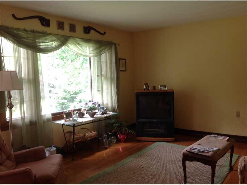 292 Leisie Road Renfrew, PA 16053 - Photo 8 of 24 Living Room. Beautiful Hardwood flooring and plenty of natural lighting in the living room