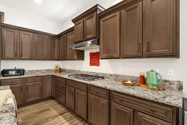 an aerial view of a house with a garden