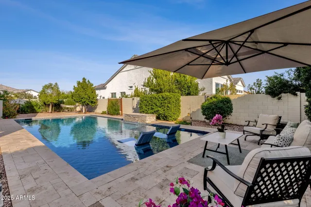 a view of a chairs and tables in the patio
