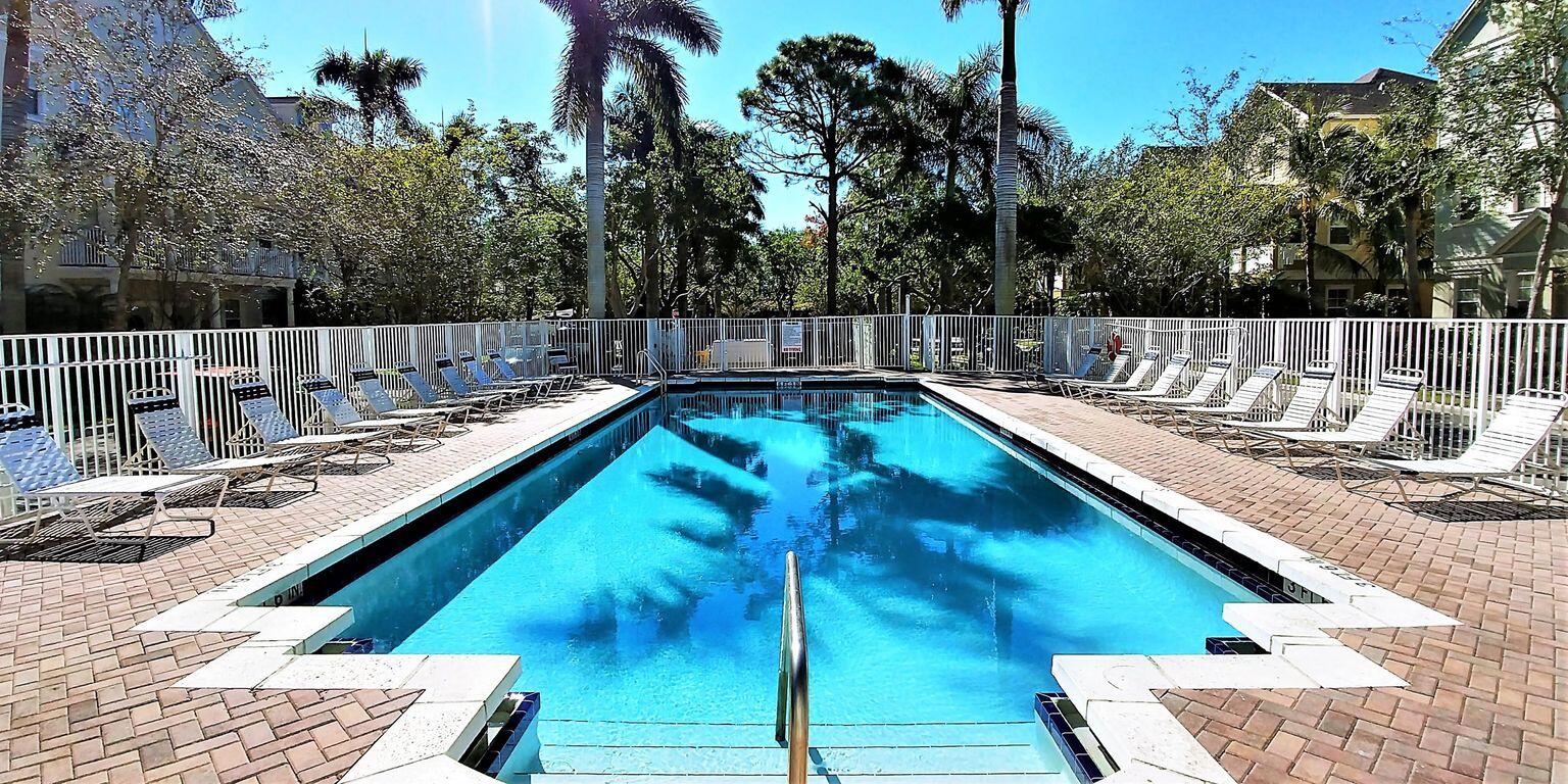 127 Seagrape Drive, Unit 201 Jupiter, FL 33458 - Photo 15 of 17 a view of a backyard with swimming pool