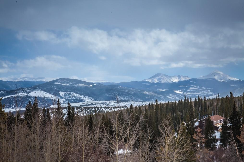 91199 Ryan Gulch Road, Unit A5 Silverthorne, CO 80498 - Photo 16 of 31 a view of a town with mountains in the background