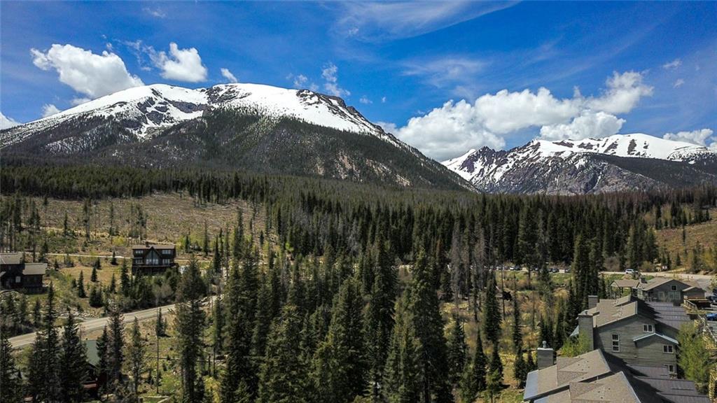 91199 Ryan Gulch Road, Unit A5 Silverthorne, CO 80498 - Photo 19 of 31 a view of a backyard with sitting area