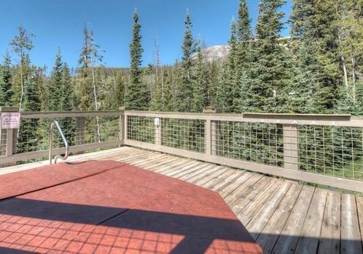 91199 Ryan Gulch Road, Unit A5 Silverthorne, CO 80498 - Photo 28 of 31 a view of balcony with wooden floor