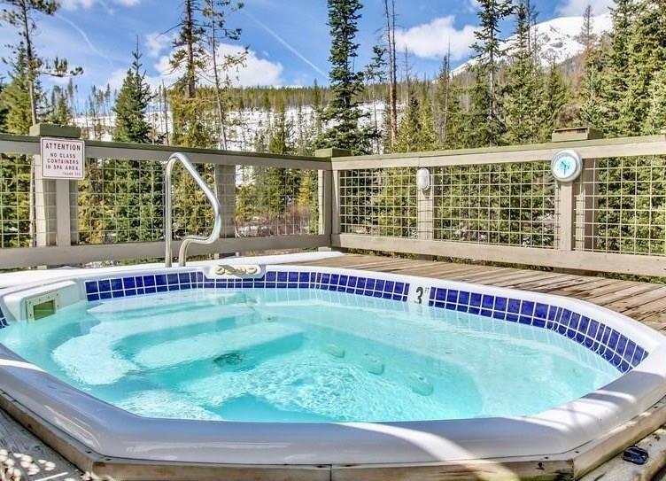91199 Ryan Gulch Road, Unit A5 Silverthorne, CO 80498 - Photo 29 of 31 a view of a swimming pool with a patio